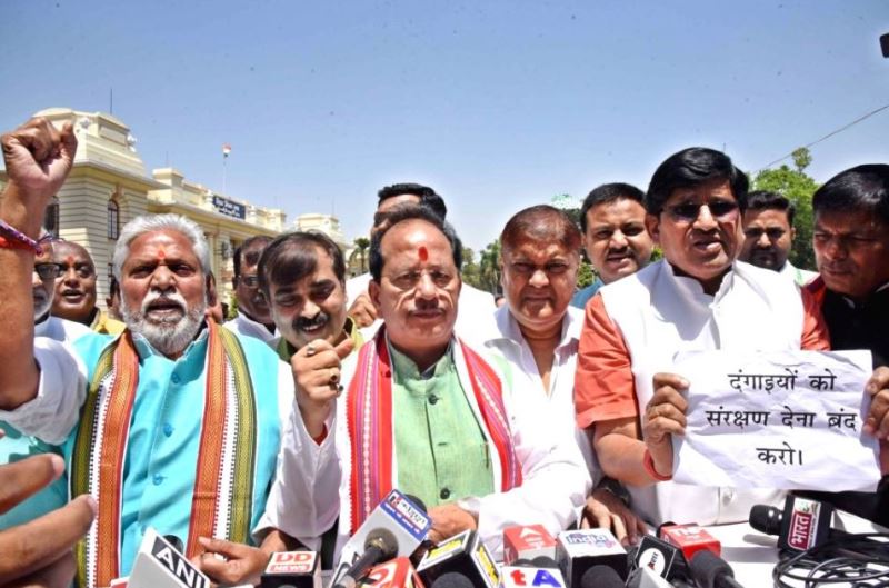 Leader of Opposition Vijay Kumar Sinha addresses the media after staging a walkout during the budget session of state assembly in Patna on 5 April 2023