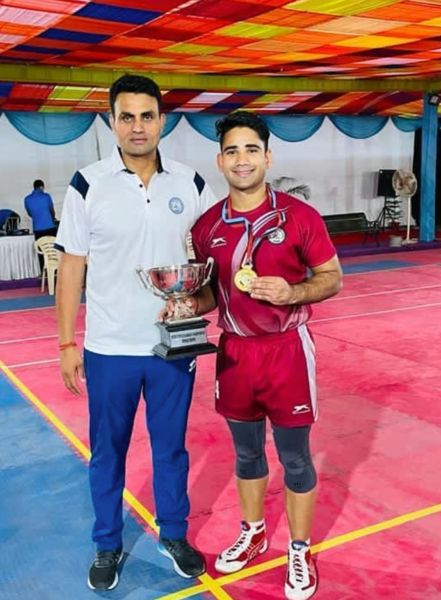 Mahender Singh (right) with his gold medal after winning the 47th Inter Services Kabaddi Championship in 2021