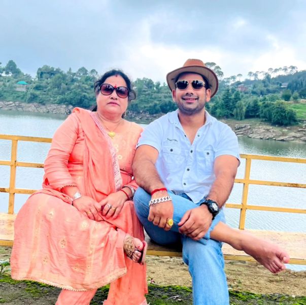 Mahender Singh with his mother
