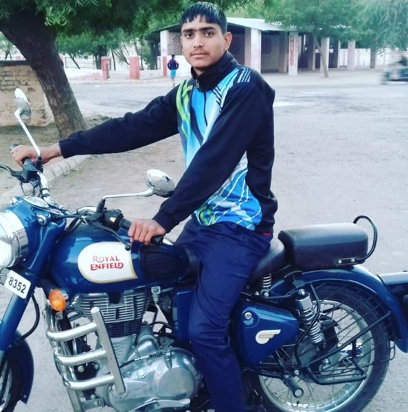 Mahipal Sinwar posing on his bike