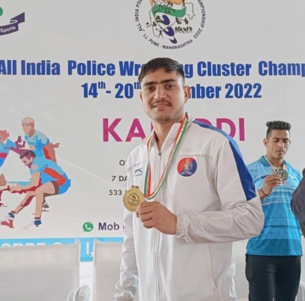 Mahipal Sinwar posing with his gold medal at the All India Police Wrestling Cluster Championship in 2022