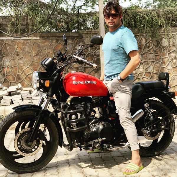 Manish Tripathi posing with his bike