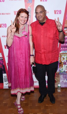 Neville Roy Singham posing with his wife
