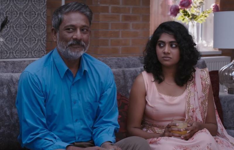 Nimisha Sajayan (as Meera), along with Adil Hussain (as Raghu), in a still from the film 'Footprints on Water' (2023)