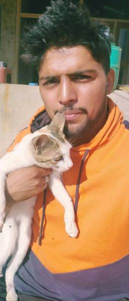 Nitesh Kumar with his pet cat