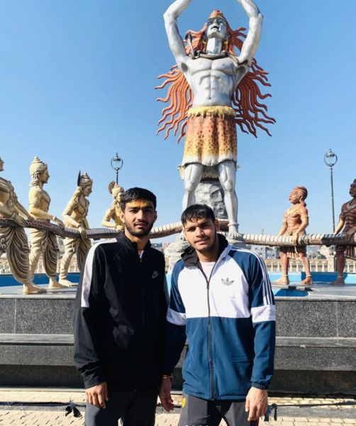Nitin Singh (right) with his friend at the Ujjain Mahakal temple