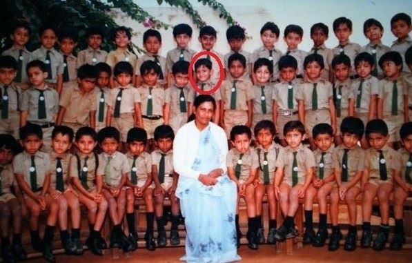 Pawan Kumar in a group picture at school