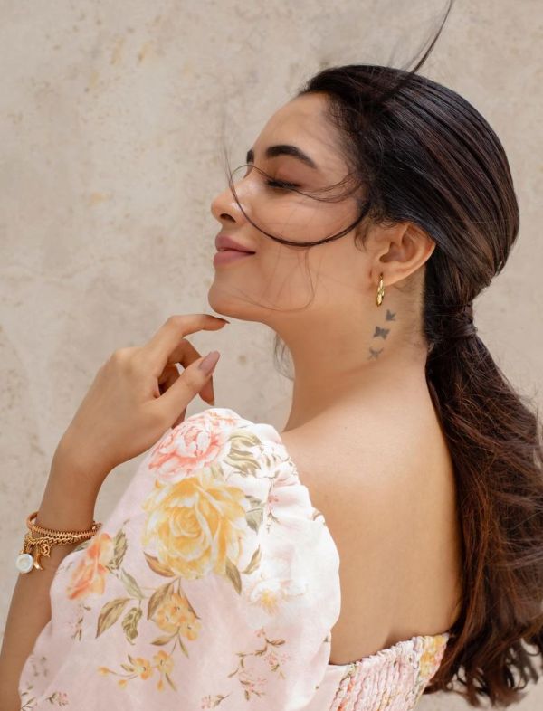 Priyanka Mohan's tattoo on the left side of her neck