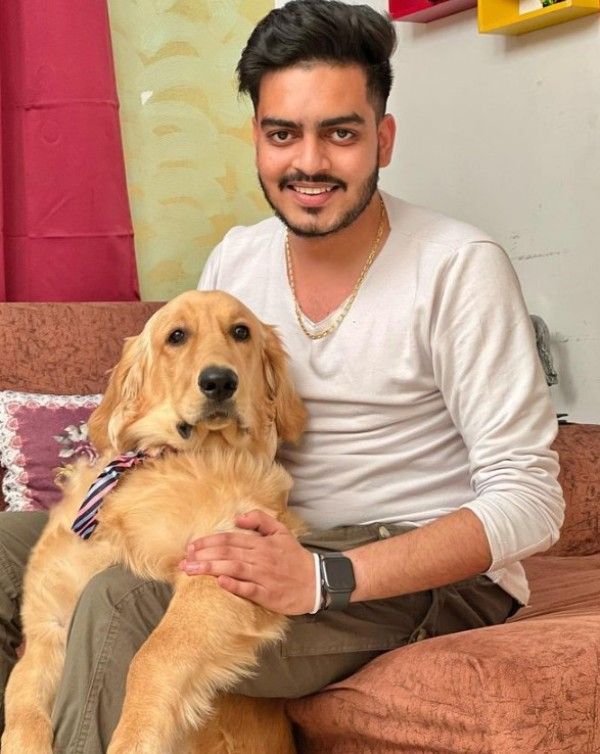 Rachit Rojha with a dog