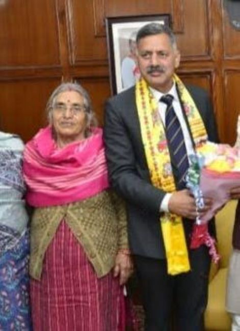 Rajesh Dharmani with his mother