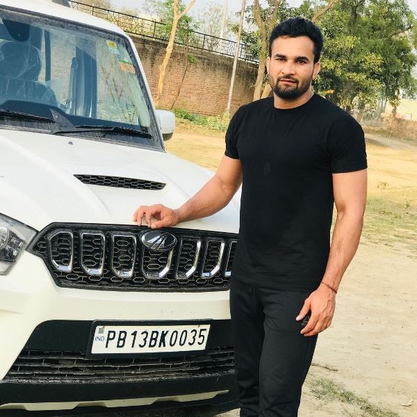 Ran Singh with his car