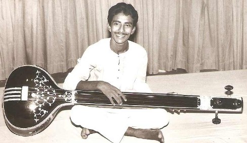 Rashid Khan while playing a Sitar