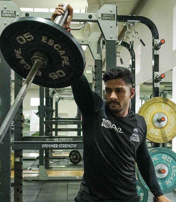 Ravindra Chouhan working out at a gym