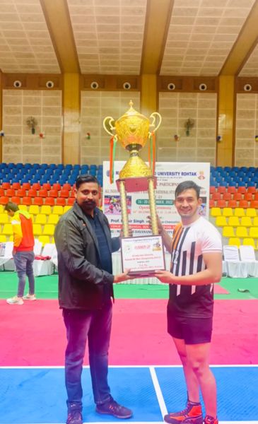 Rinku Sharma (right) with the runners-up trophy of All India Inter University Championship 2022