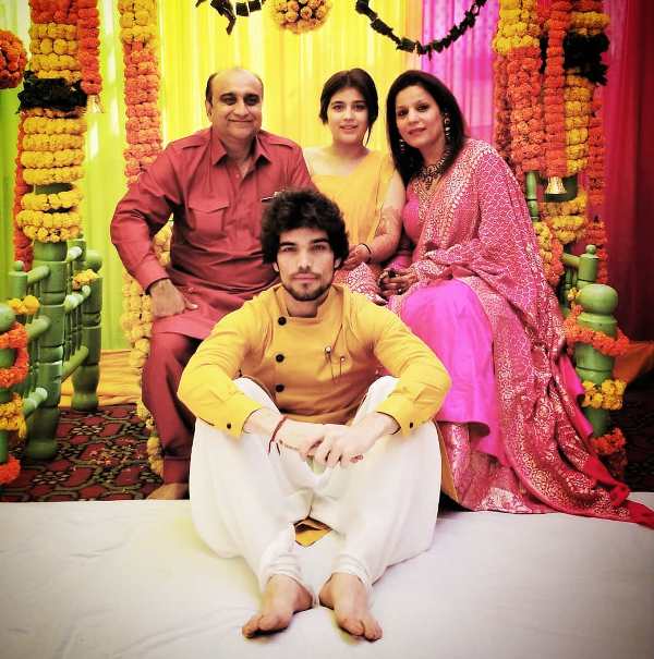 Rishabh Sawhney with his parents and sister