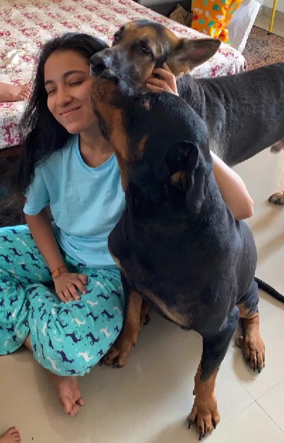 Romsha Singh with her pet dogs