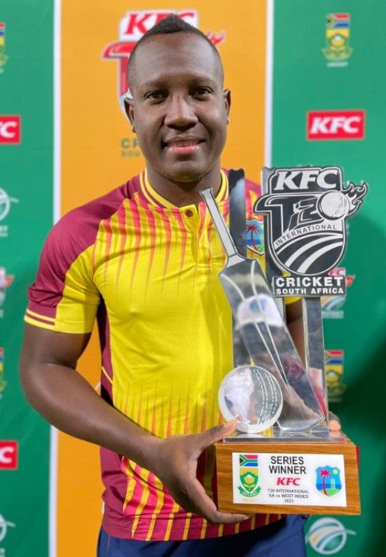 Rovman Powell posing with trophy after winning his first T20 series as captain