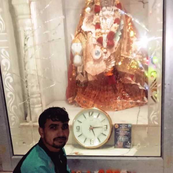 Sachin Narwal while worshipping in a temple