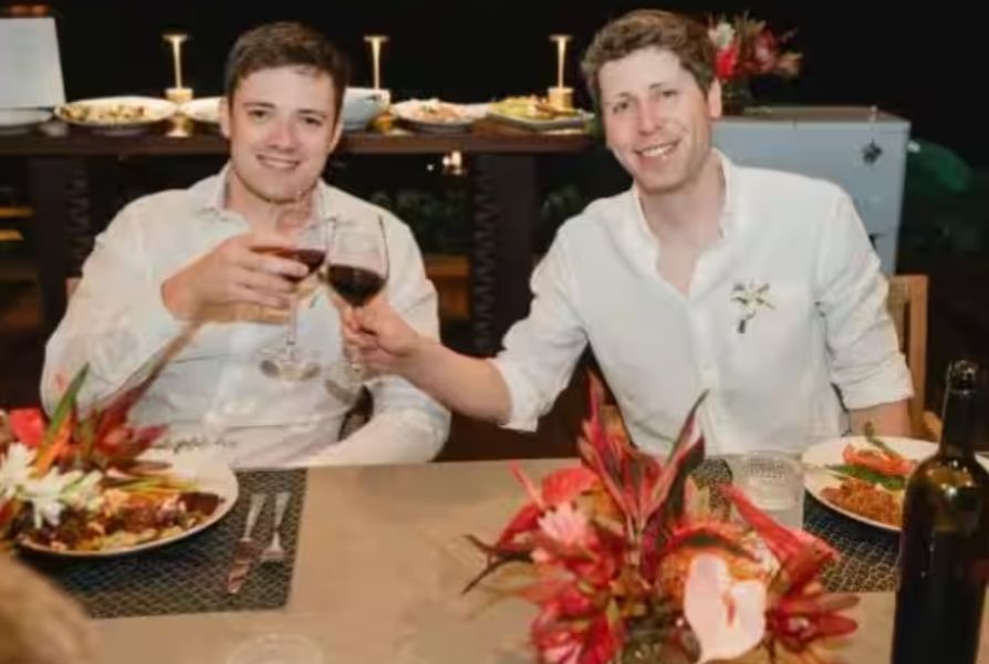 Sam Altman (right) drinking a glass of wine with Oliver Mulherin at their wedding