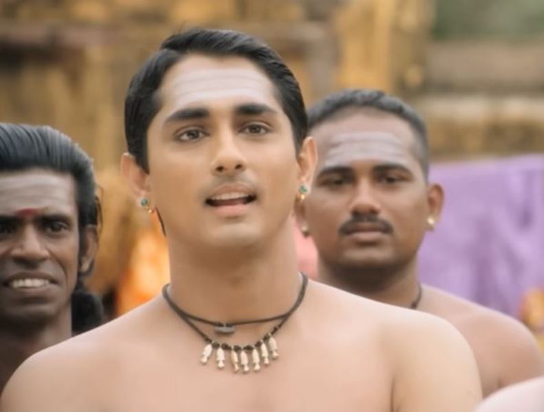 Siddharth as 'Thalaivankottai Kaliappa Bhagavathar' in the film 'Kaaviya Thalaivan' (2014)