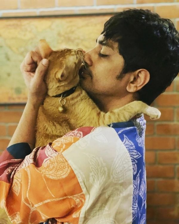 Siddharth with his cat, Tatcho