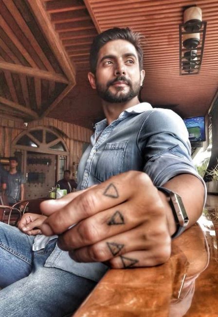 Tattoo's inked on Kamaljeet's left hand fingers