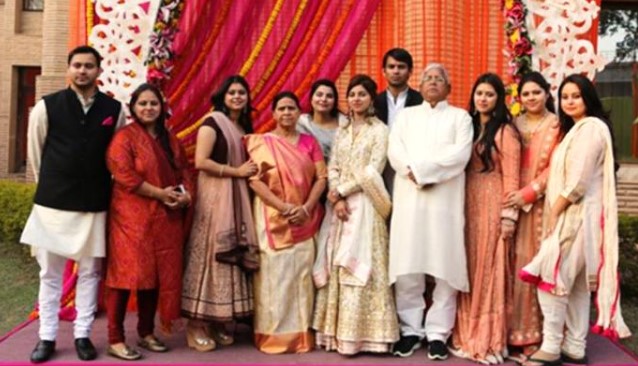 Tej Pratap Yadav (standing back) with his parents, seven sisters, and brother (extreme left)