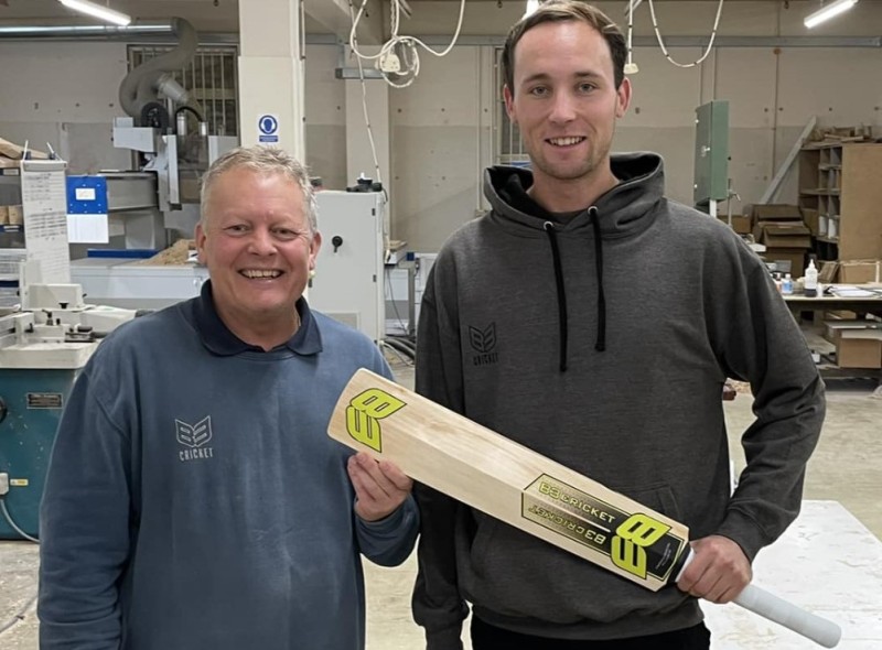 Tom Hartley (right) after signing up with B3 Cricket