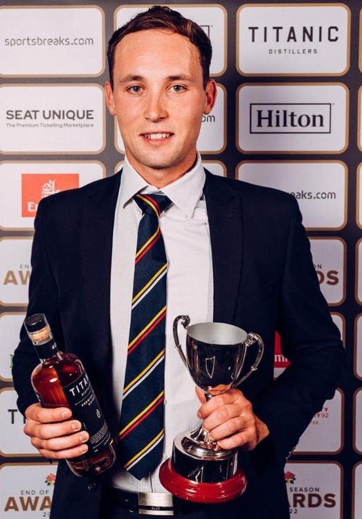 Tom Hartley with Young Player of the Year award