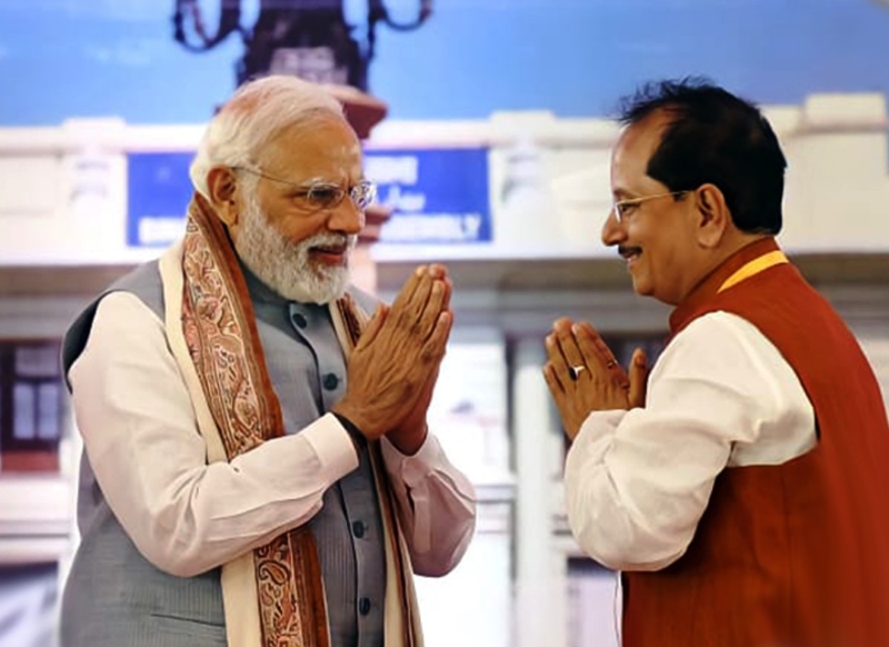 Vijay Kumar Sinha greeting Prime Minister Narendra Modi