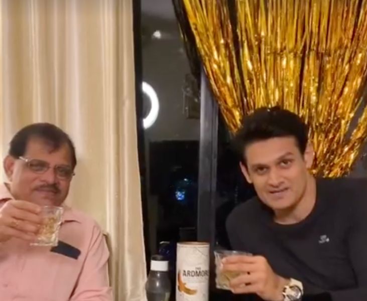 Vishal Nayak enjoying whiskey with his father