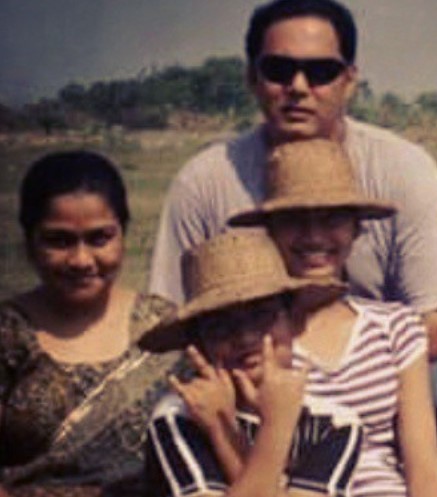 A childhood picture of Arundhati Garnaik with her parents and brother