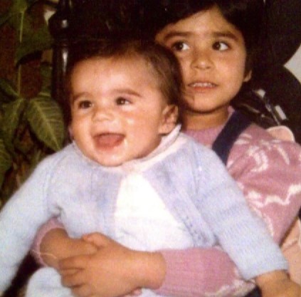 A childhood picture of Devina Badhwar with her brother (in lap)