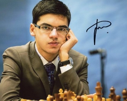 A photograph autographed by Anish Giri
