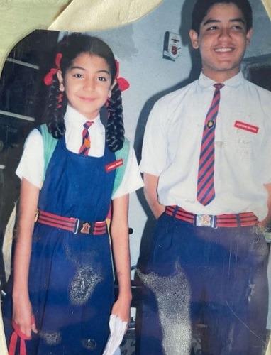 A picture of Karnesh Sharma with Tripti Dimri wearing school dress