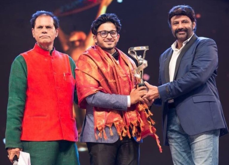 Deepak Saroj (centre) being awarded Nandi Award for Best Child Actor