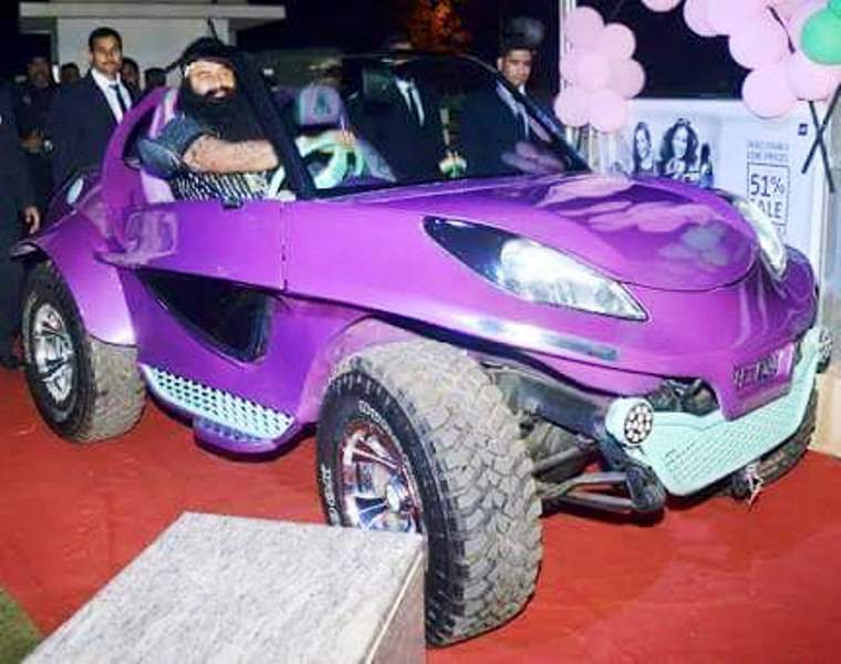 Gurmeet Ram Rahim driving his purple car