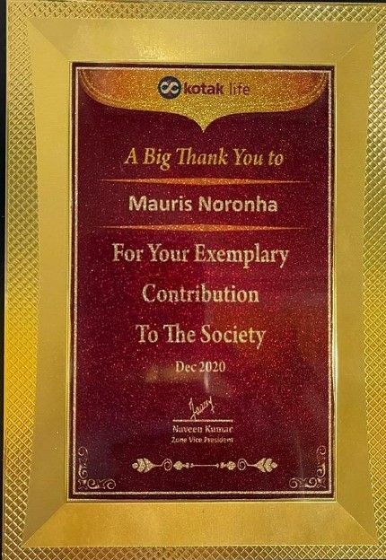 Honorary certificate given to Mauris Noronha by Kotak Mahindra Bank