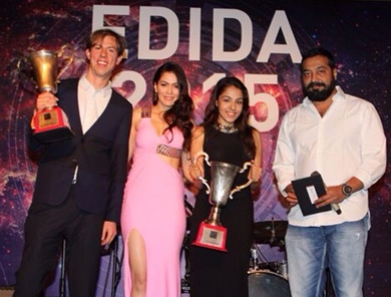 Lekha Washington (second from right) after receiving the EDIDA Award
