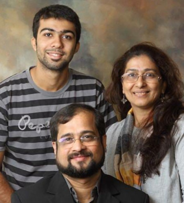 Nikhil Wagle with his wife and son