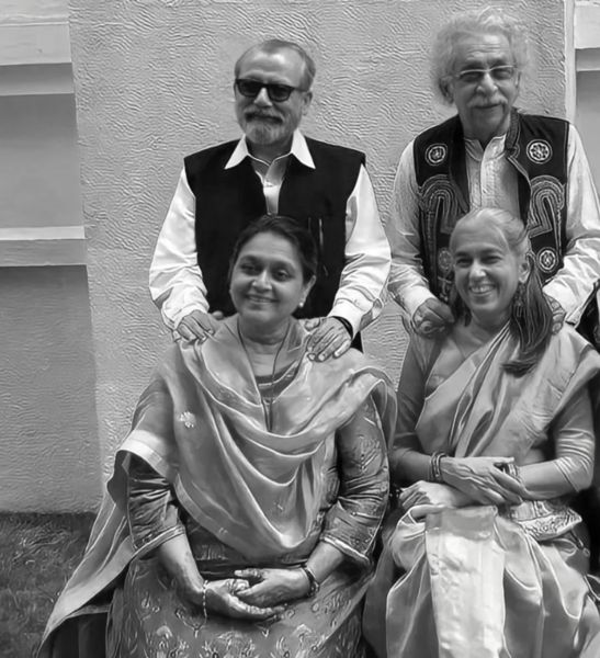 Pankaj Kapur (standing on left) with Supriya Pathak (sitting on left), Ratna Pathak (sitting on right), and Naseeruddin Shah (standing on right)