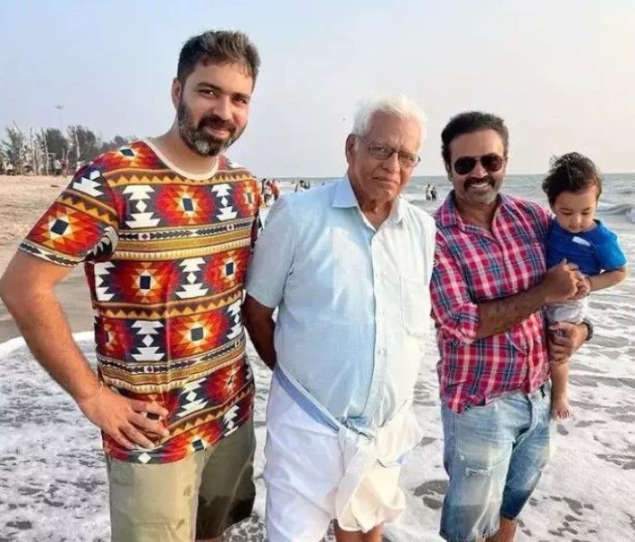 Rony David Raj (right) with his father and brother