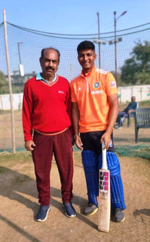 Sachin Dhas with his childhood coach Sheikh Azhar