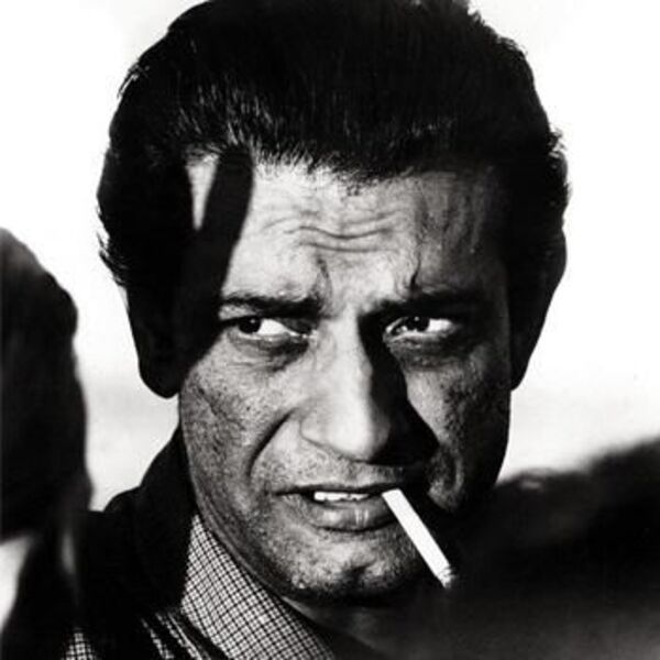 Satyajit Ray smoking a cigarette during one of his shoots