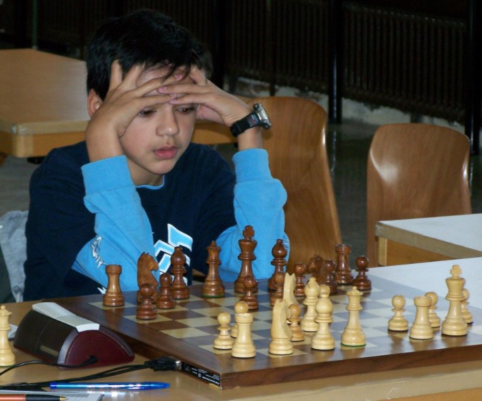 Young Anish Giri while playing chess