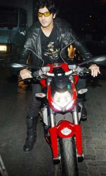 Zayed Khan posing on his Ducati Street Fighter 1100 cc